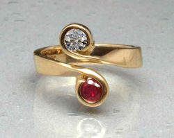 gold ruby and diamond crossover ring